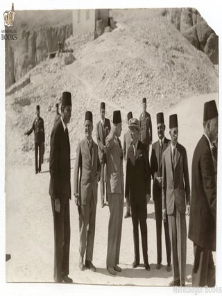 FAROUK bin Fuad King (Egyptian - 1920-1965) talking to Howard Carter behind him Etienne Drioton - Copyright Peggy Joy Library